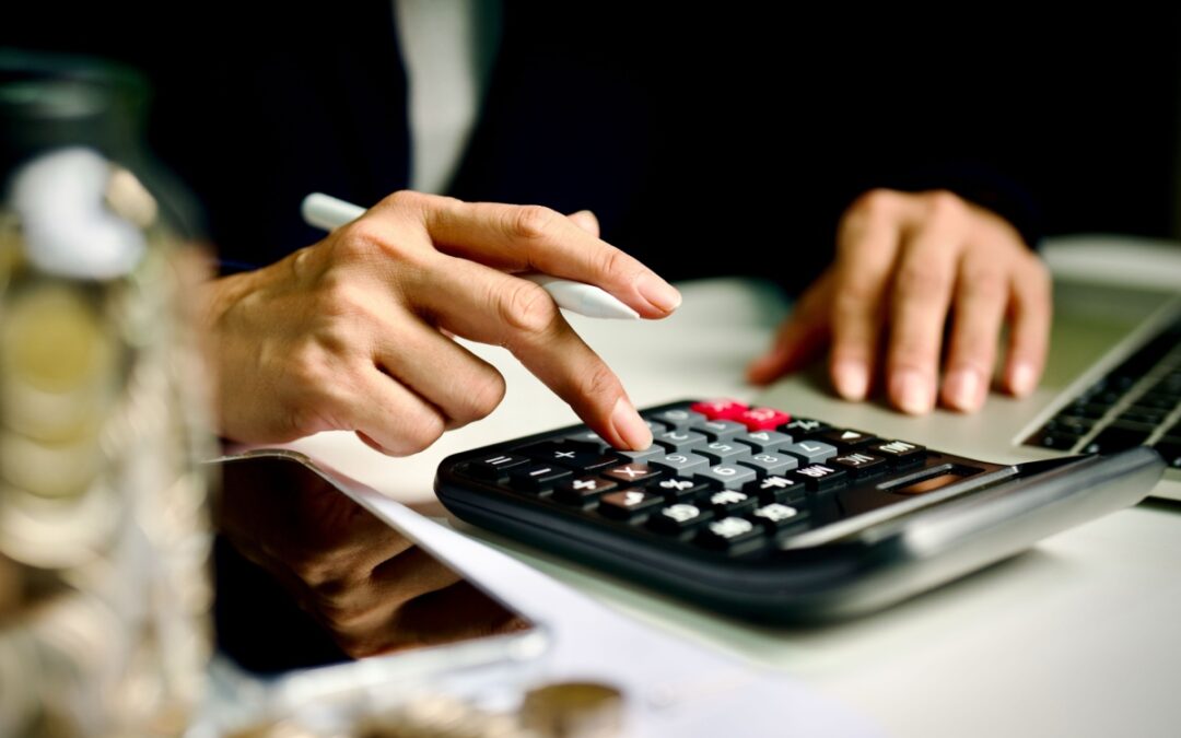 A person using a calculator.