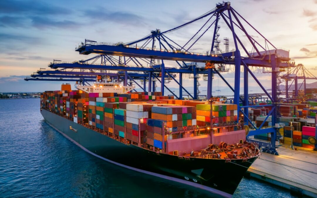 A container cargo ship at a commercial dock.