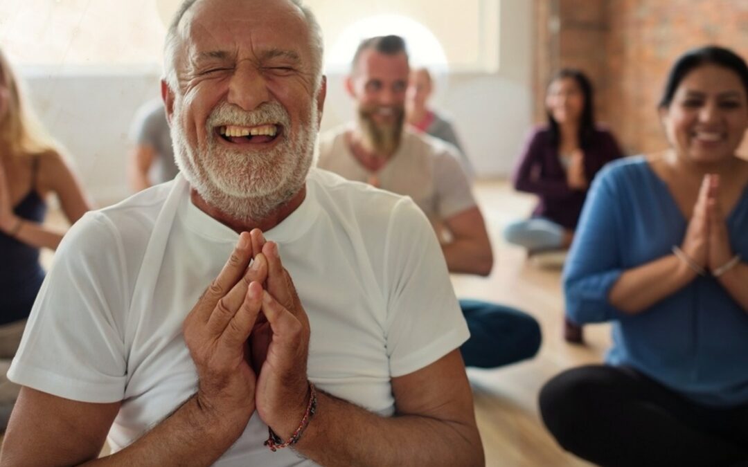 A group of people meditating.