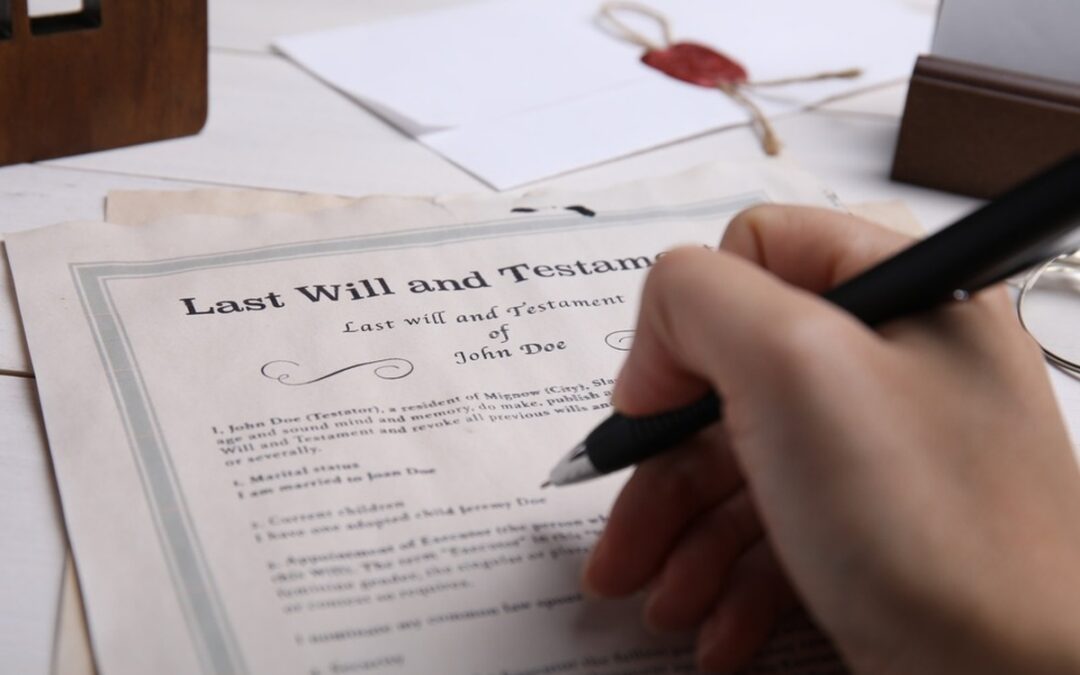 A person signing a will.